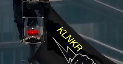 KLNKR Racing flag flying off a bike